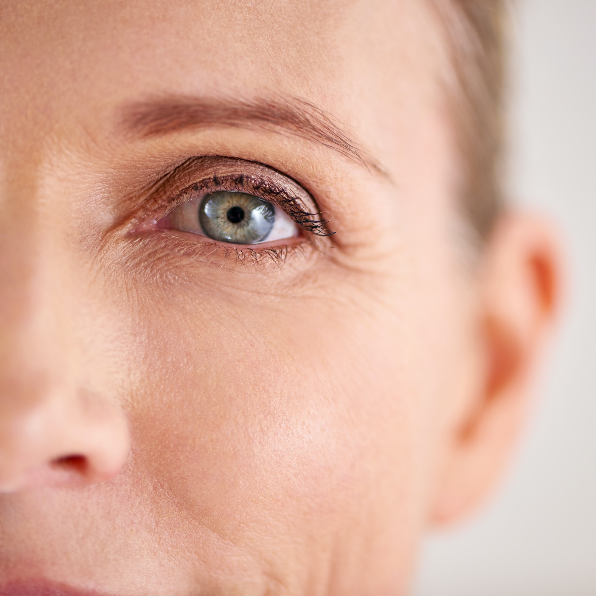 Closeup shot of an attractive mature woman with the focus on her eyes